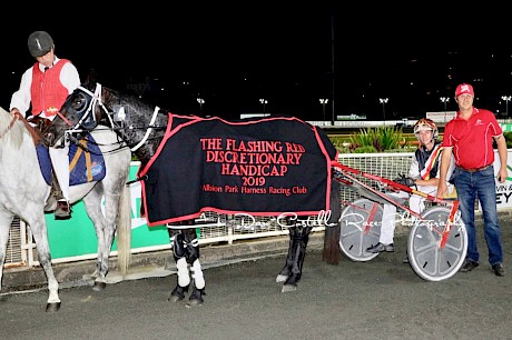 Northview Hustler with driver Hayden Barnes and trainer Al Barnes after his fresh-up win nine days ago. PHOTO: Dan Costello.