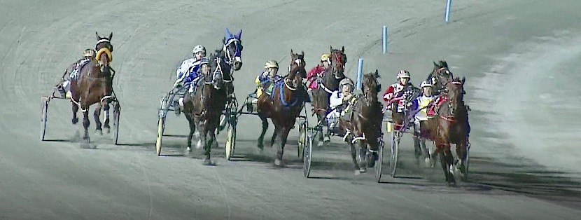 Vasari, extreme left, is four wide and still near the tail of the field as they head for home.