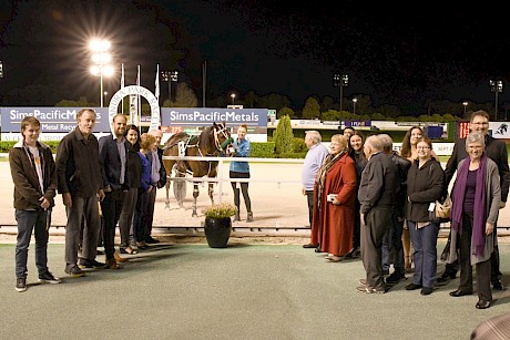 John Street, at right nearest rail, enjoys a recent win by Make Way at Auckland with his big team of partners. PHOTO: Race Images.