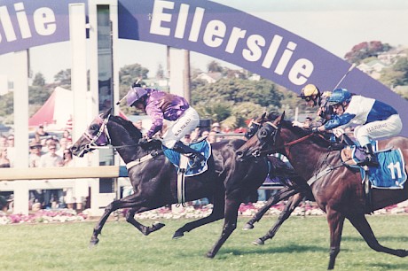 Jockey Bruce Herd pumps his fist as Mikki Street downs the favourite Sharvasti (Noel Harris ) to win the 2006 Zabeel Clasic at Ellerslie.