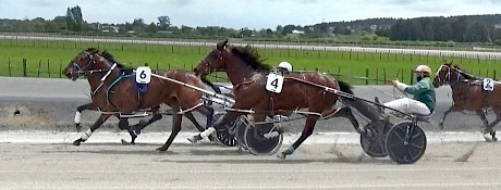 Mathew James (4) moves up to challenge on the home turn at Pukekohe today.
