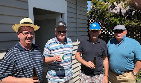 Cheers … Kevin Bell, second from left, with the original Christchurch crew, from left, Brian Rabbitt, Denis James and Michael Brereton, celebrating the sale of Beaudiene Western.