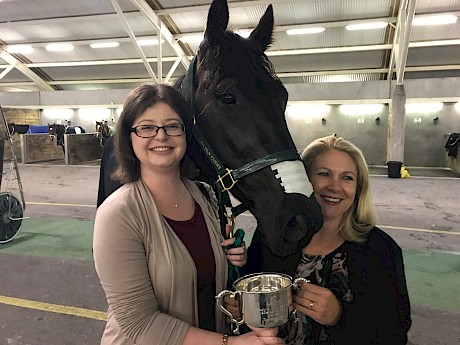 Shannon Flay, left, with office assistant Merle Gradwell, after Northview Hustler’s Spring Cup win.