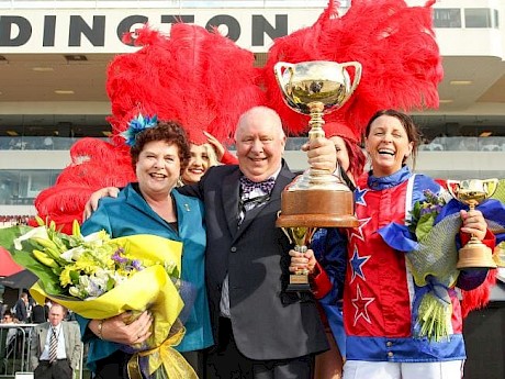 Merv and Meg Butterworth celebrate winning the New Zealand Cup with trainer-driver Kerryn Manning.