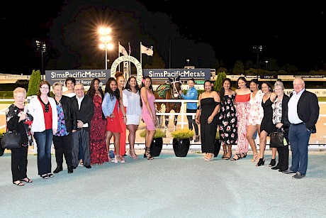 Representatives of the Pacific Nations Academy join in the celebrations after Steam Punk’s win. PHOTO: Race Images.