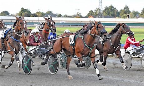 Lincoln Moment (10), with Jay Abernethy in the sulky, sustains a good run to win at Manawatu last night. PHOTO: Royden Williams.