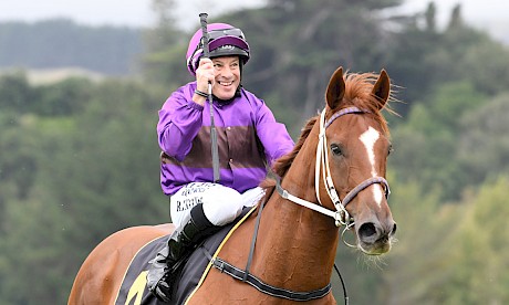 Robbie Hannam salutes on brave debut winner Lincoln Green. PHOTO: Peter Rubery/Race Images.