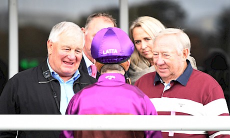 Rider Jonathan Riddell gives owners John Street, right, and Ian Middleton the lowdown on Lincoln Hills after his clearcut win. PHOTO: Peter Rubery/Race Images.
