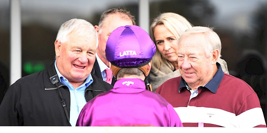 Rider Jonathan Riddell gives owners John Street, right, and Ian Middleton the lowdown on Lincoln Hills after his clearcut win. PHOTO: Peter Rubery/Race Images.