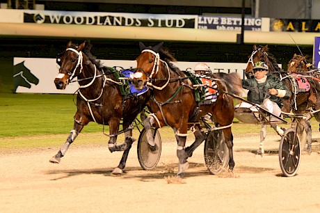 Driver Andre Poutama gets the best out of Tommy Lincoln, outer, as he staves off The Empress. PHOTO: Peter Rubery/Race Images.