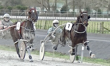 Billy Lincoln, inner, is about to be collared by Matai Geordie near the finish today.