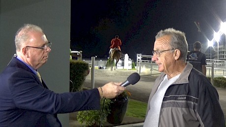 Trainer Ray Green, being interviewed here by Trackside’s big fish Craig Thompson, is sending more and more pacers to Australia.