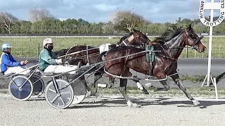 Double Or Nothing runs past Willedu at the finish of his heat.