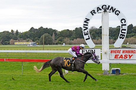 Platinum Volos and Charlotte O’Beirne are four lengths clear and cruising in their upset win at Otaki today. PHOTO: Peter Rubery/Race Images.