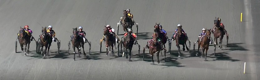 The challengers are spread right across the track at the finish.