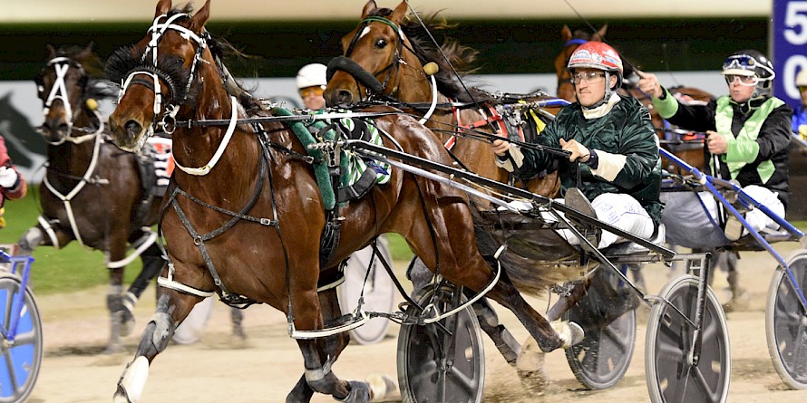 Copy That (Zac Butcher) rockets home wide out to score an off-the-canvas win at Auckland. PHOTO: Kenton Wright/Race Images.