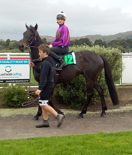 Strapper Josh Herd leads Kamanda Lincoln and Charlotte O’Beirne before today’s trial.