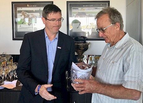 Alabar Stud general manager Graeme Henley presents the Alabar Classic trophy to Copy That’s trainer Ray Green.