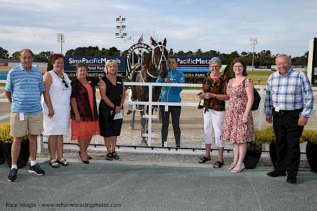 Celebrations in the winners’ circle after Man Of Action’s powerful win. PHOTO: Race Images.