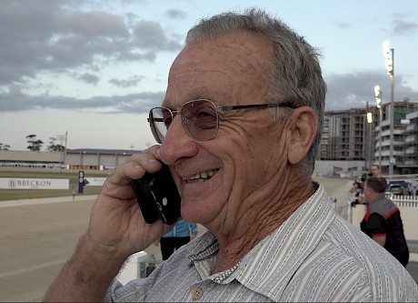 Ray Green on the phone to owner Merv Butterworth after Copy That’s Derby Prelude win.