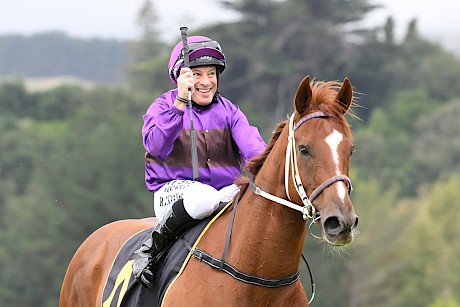 Robbie Hannam salutes on Lincoln Green after his debut win. PHOTO: Peter Rubery/Race Images.