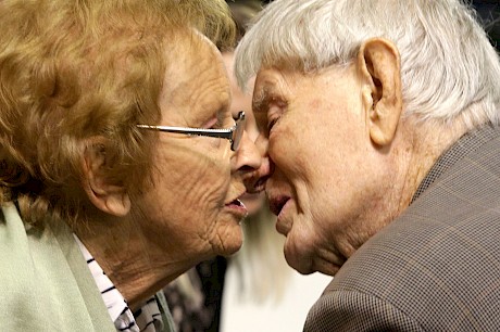 Roberts kisses his late wife June after a big win at Alexandra Park. PHOTO: Trish Dunell.