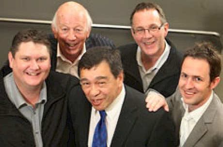 Surviving callers Aaron White, left, and Tony Lee, second from right, were at Alexandra Park in 2010 on the retirement of Alby Gain, centre. Mark McNamara, now calling in Hong Kong is at right with retired gallops caller Keith Haub second from left.