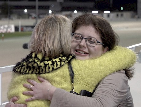 Shannon Flay gets a hug from Christine Rupp after Tommy Lincoln’s win.