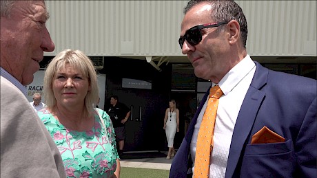 Platinum Invador’s owners Neville McAlister, right, and John Street with Lisa Latta who trains the horse in New Zealand.