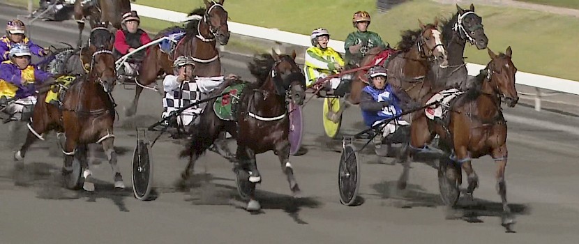 Northview Hustler (green silks) makes good ground up the inner behind Cruz, Colt Thirty One and One Change in the Queensland Cup last Saturday night.