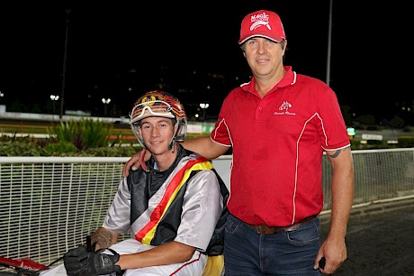 Trainer Al Barnes and his son Hayden after Northview Hustler’s debut win in Queensland in the Flashing Red. PHOTO: Dan Costello.