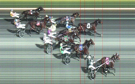Copy That sails down the outskirts of the Albion Park track, with driver Anthony Butt sitting still, to win going away from Balraj, Rockin Marty and Spankem.
