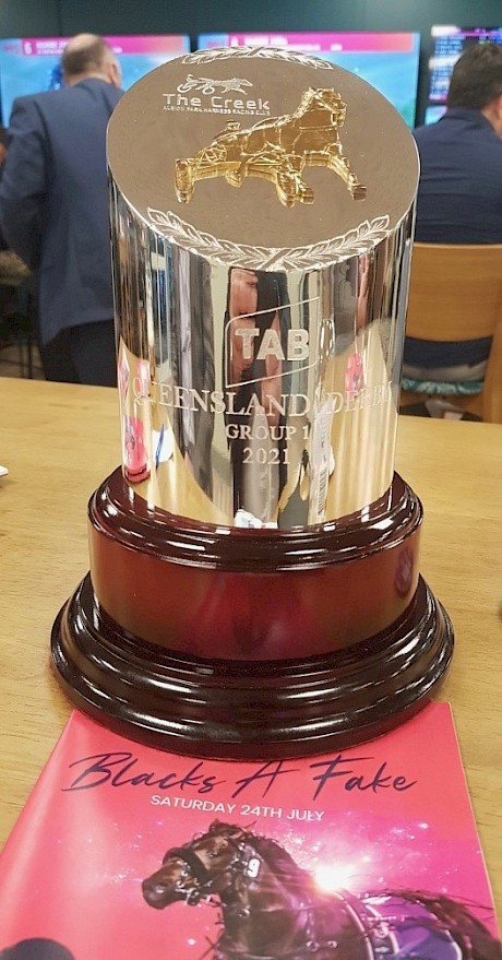The Queensland Derby trophy won by American Dealer.