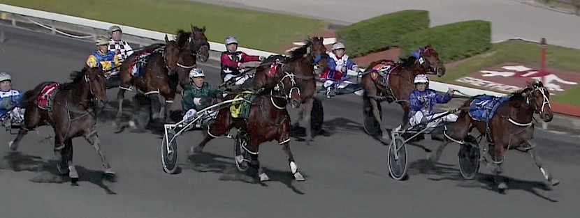 Amazing Dream sprint lanes past Copy That, centre, close to home.