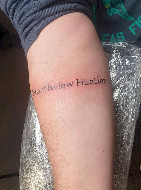 Northview Hustler’s biggest fan Carl Officer had his fave’s name tattooed on his arm.