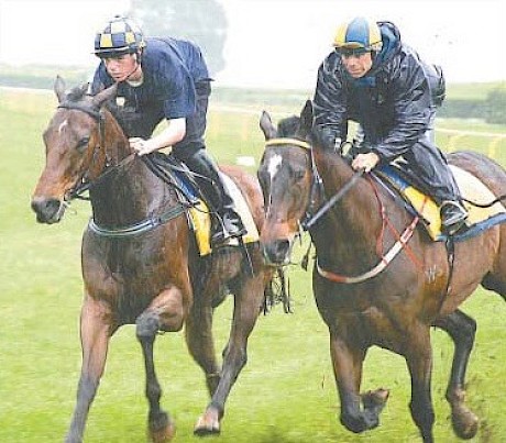 Craig Grylls, left, riding trackwork in 2005 at the age of 15 with his dad Garry.