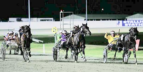 Mr Feelgood and Anthony Butt sneak up the passing lane to deny Blacks A Fake in the 2009 Interdom Grand Final on the Gold Coast.