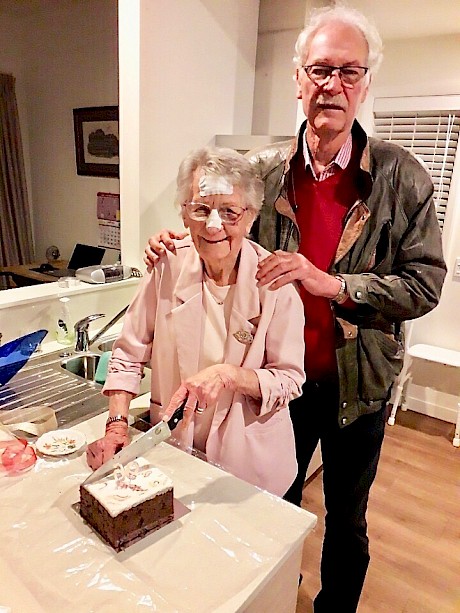 Riverman Sam’s owner Phil Cook with Joan Grice as she cuts her 96th birthday cake yesterday.