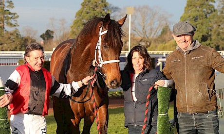 Michael House celebrates yesterday with jockey Chris Johnson and stable king pin Nicci Brown. PHOTO: Race Images.