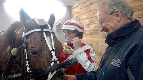 All smiles in the camp as driver Maurice McKendry and trainer Ray Green ungear Copy That last night.