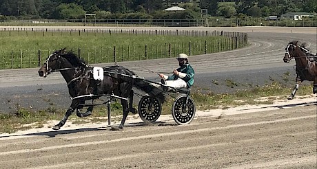 Zachary Butcher puts his foot down on Ideal Kingdom on the home turn.