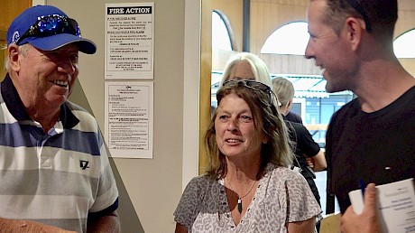 Top reinsman Nathan Jack, who drove Copy That during his spring campaign in Victoria, congratulates John Street on one of his buys today, with Debbie Green looking on.