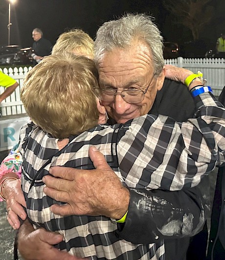 Trainer Ray Green gets a well done hug from Lincoln Farms’ owner Lynne Street.