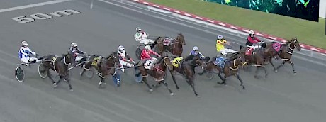 They’re spread right across the track but Captain Nemo, third from the outside, gets up for third.