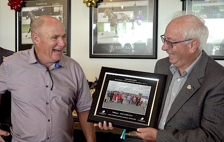 Part owner Phil Kelly, left, shares a joke with the Mangere Lawn Cemetery race sponsor.