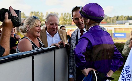 Trainer Lisa Latta and owners John Street and Neville McAlister hear from jockey Ryan Elliot after Platinum Invador’s Auckland Cup win at Pukekohe in March. PHOTO: Megan Liefting/Race Images.