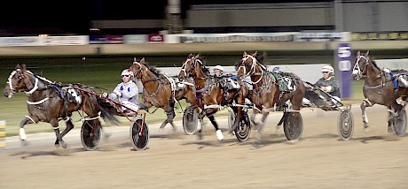 Sugar Ray Lincoln, second from right, fights back for second.