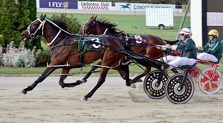 Debbie Lincoln sweeps past Princess Gracy near the finish.