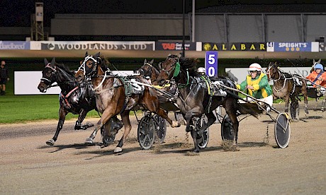 Whats Up The Hill, centre, downs race rival Hillbilly, outer, at Auckland last month. PHOTO: Megan Liefting/Race Images.