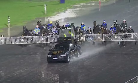 Johnny Lincoln, outer, spooks at water spray from the mobile car at Alexandra Park.